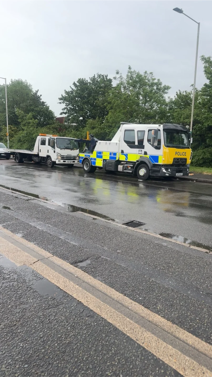 Police Recovery truck and flatbed tow truck
