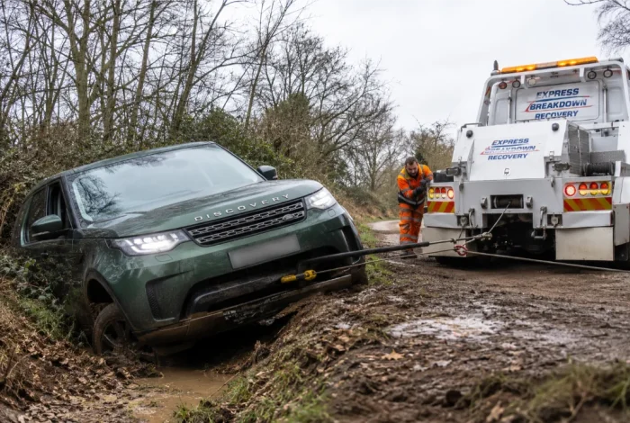 Land Rover Discovery Winch Recovery from Muddy Ditch